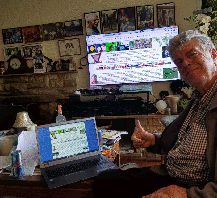 Robin Lovelock with Laptop in lounge