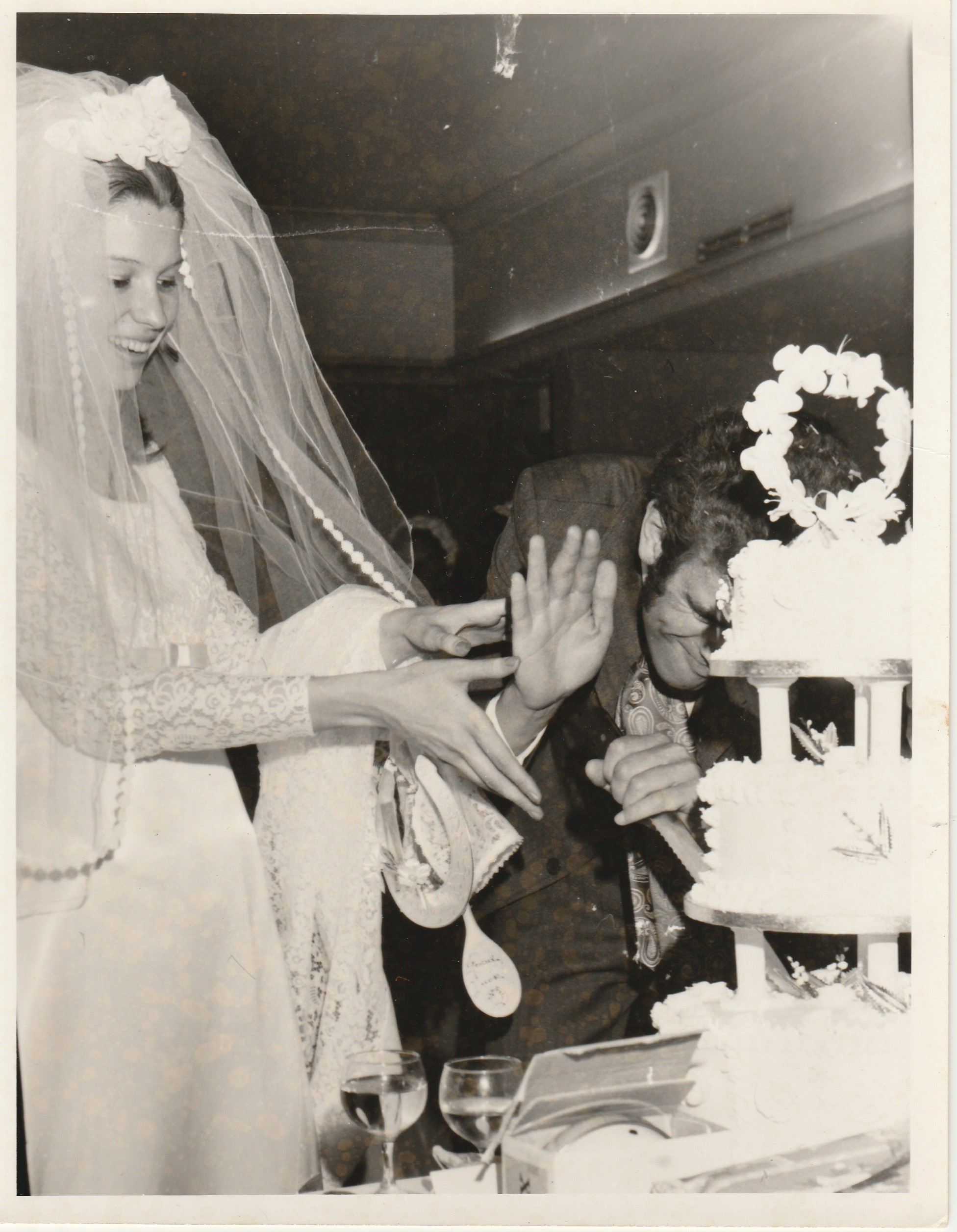 old 1971 wedding photo - cutting the cake