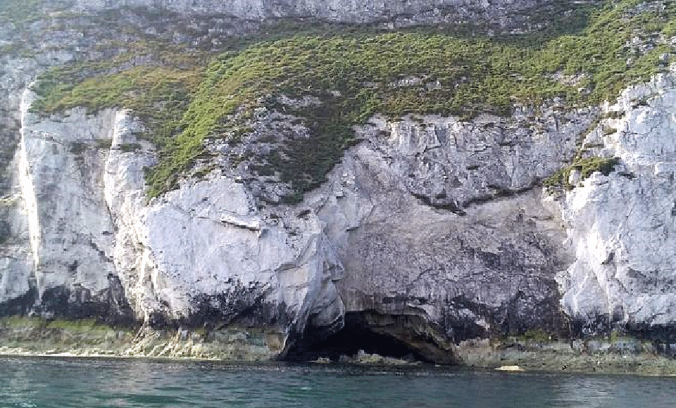 one of the caves, west of where Snoopy paused.